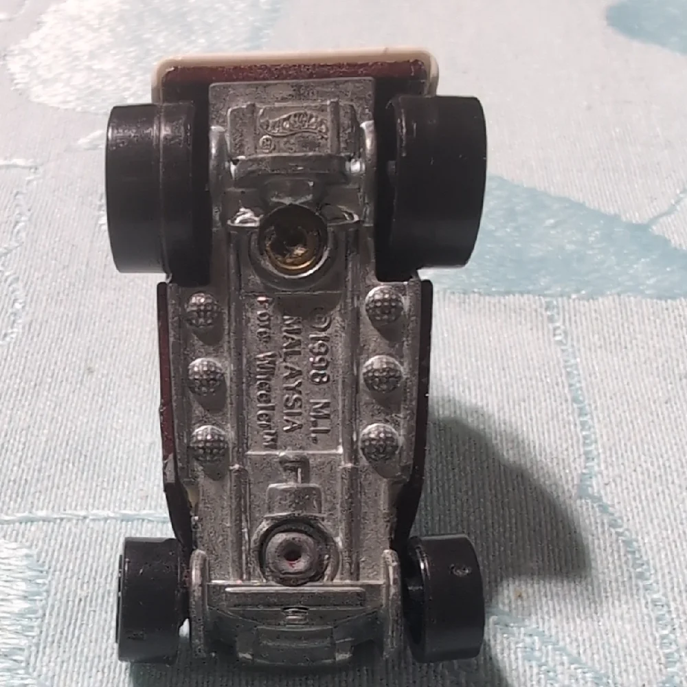 Gold and White Toy Car
